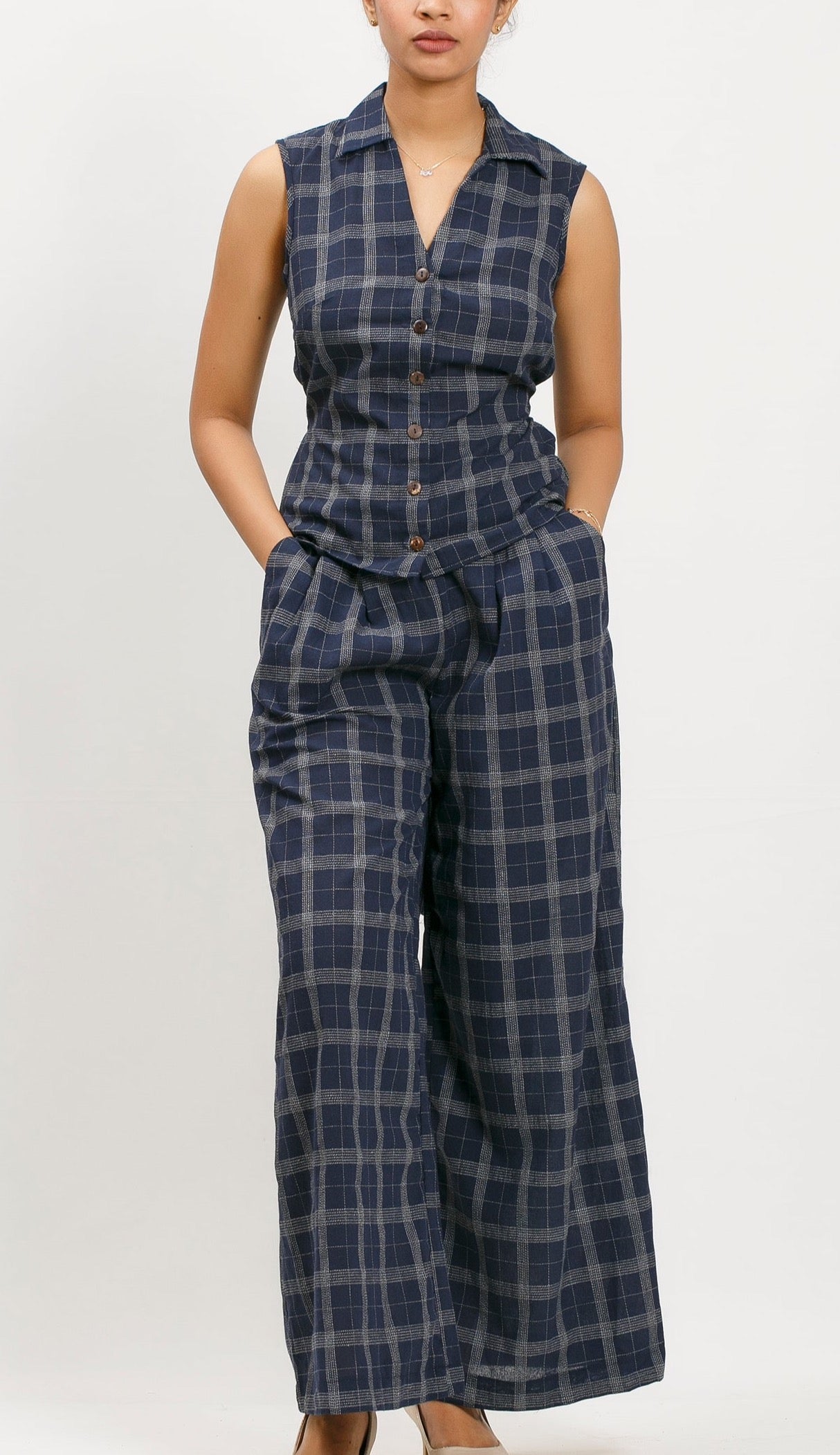 Amaro sleeveless collared top with coconut shell buttons and Waist tie