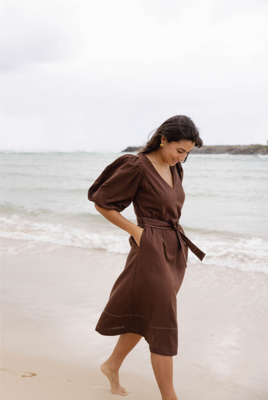 Puff sleeve brown midi dress with v-neckline and waist tie